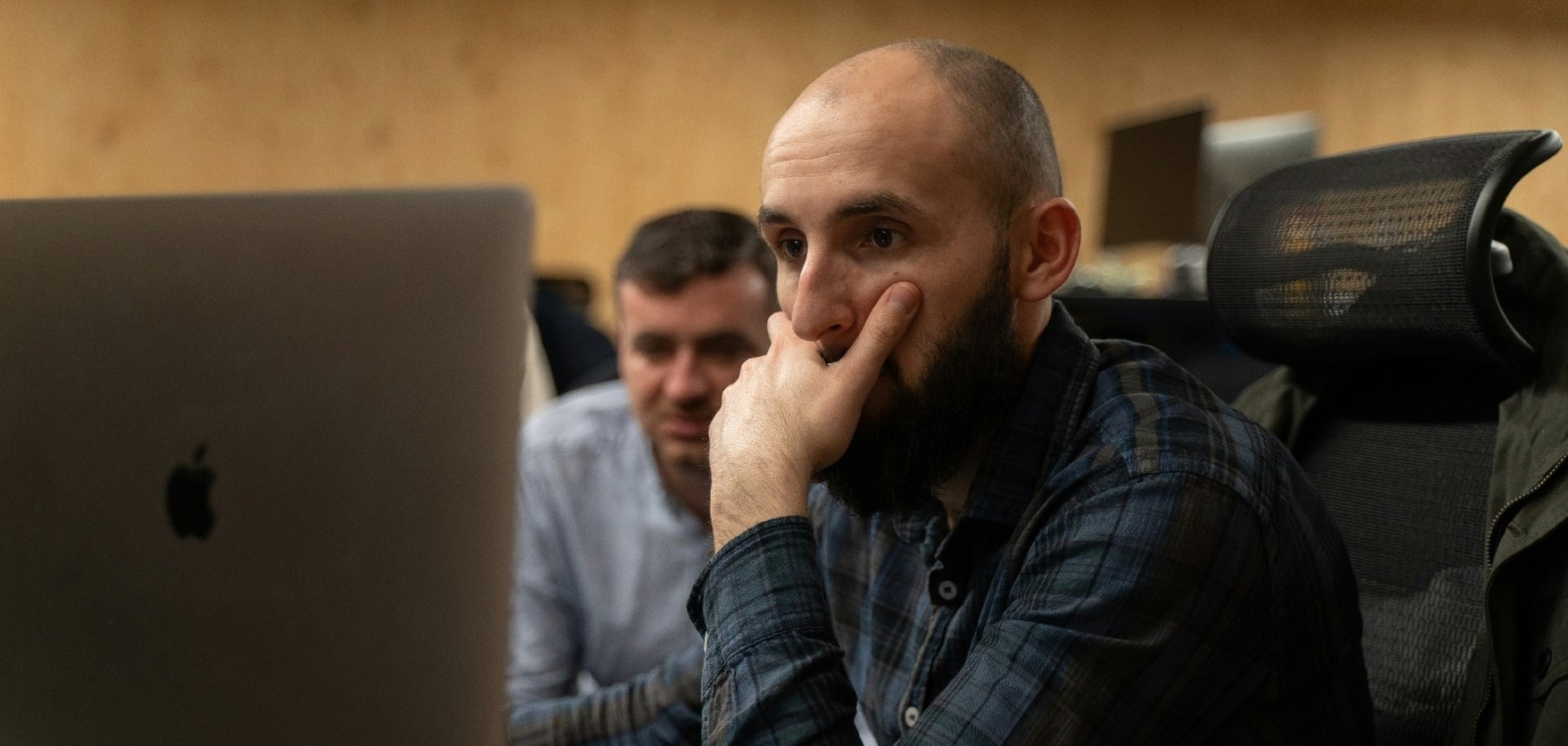 Man stressed at laptop